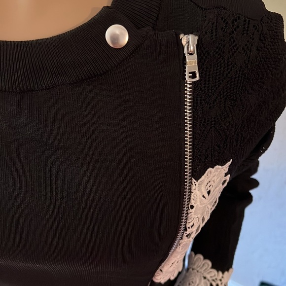 Gorgeous black sweater top with white lace embellishments. - Picture 3 of 6